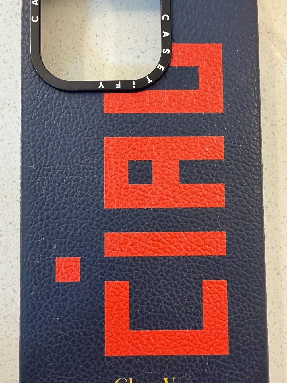 Casetify Navy Blue and Red Leather-Textured iPhone Case with Black Camera Frame